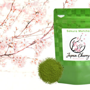 A packet of Sakura Matcha green tea powder is shown with cherry blossoms and a small pile of the powder itself.