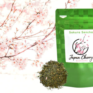 A vibrant image showcasing Sakura Sencha tea, featuring a green bag with a label, a pile of tea leaves, and a beautiful cherry blossom background.